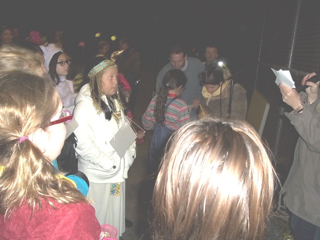 Kids gather for the announcement of winning costumes.