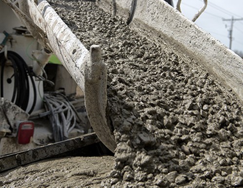 cement_truck_chute_pouring_concrete